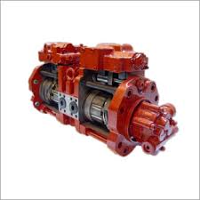 Technician inspecting hydraulic pump